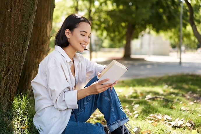 Beautiful Young Asian Girl Student Sits Park Tree Reading Book Smiling Enjoying Warm Su